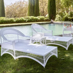 White Rattan Sun Lounger With Blue Ikat Cushion